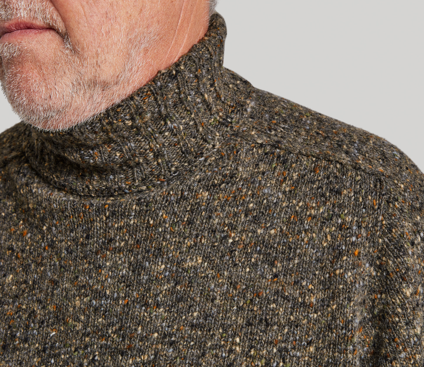 Merino Wool Donegal Roll Neck Jumper in Dark Natural Tweed