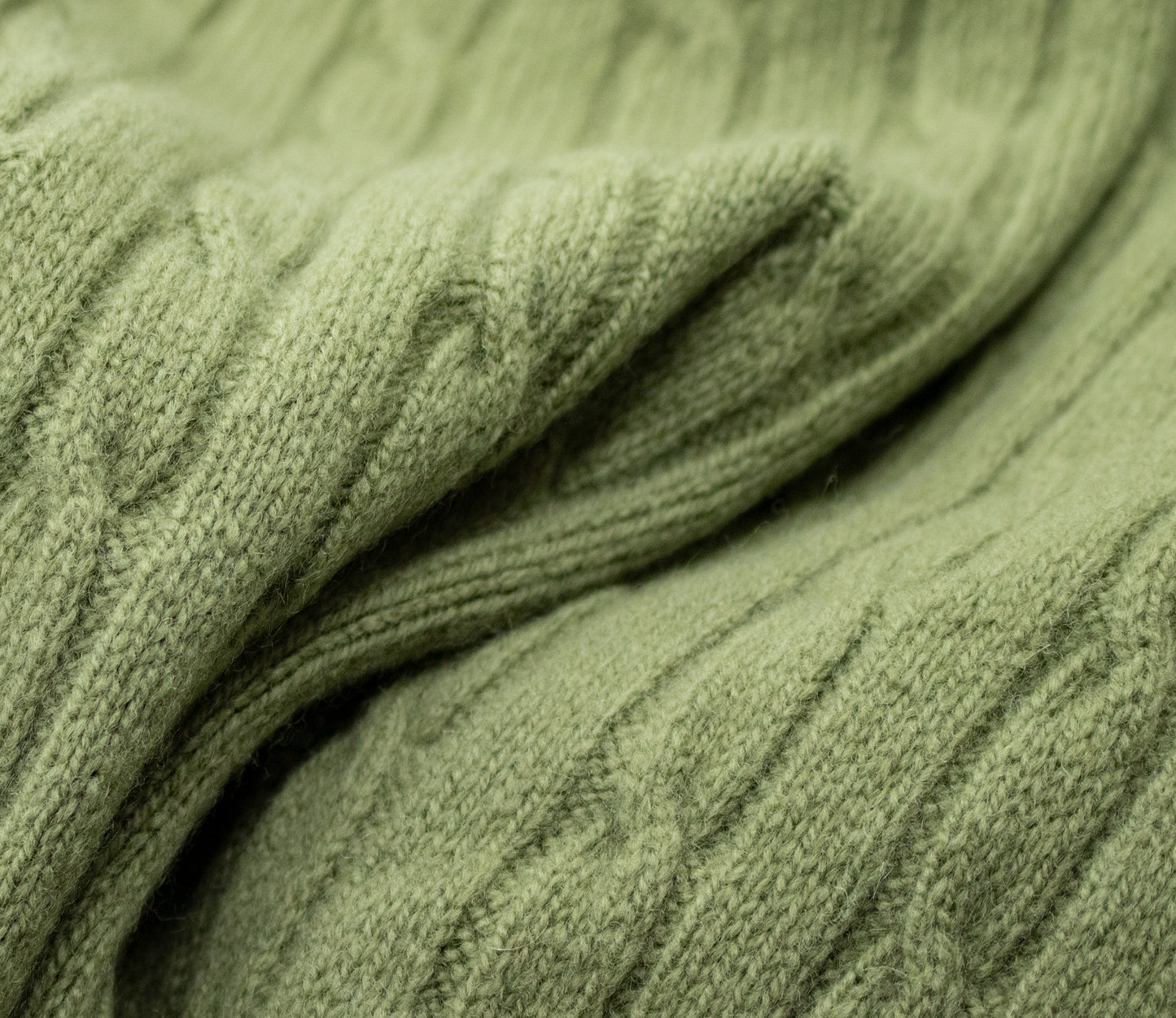 Geelong Lambswool Cable Roll Neck Jumper in Green