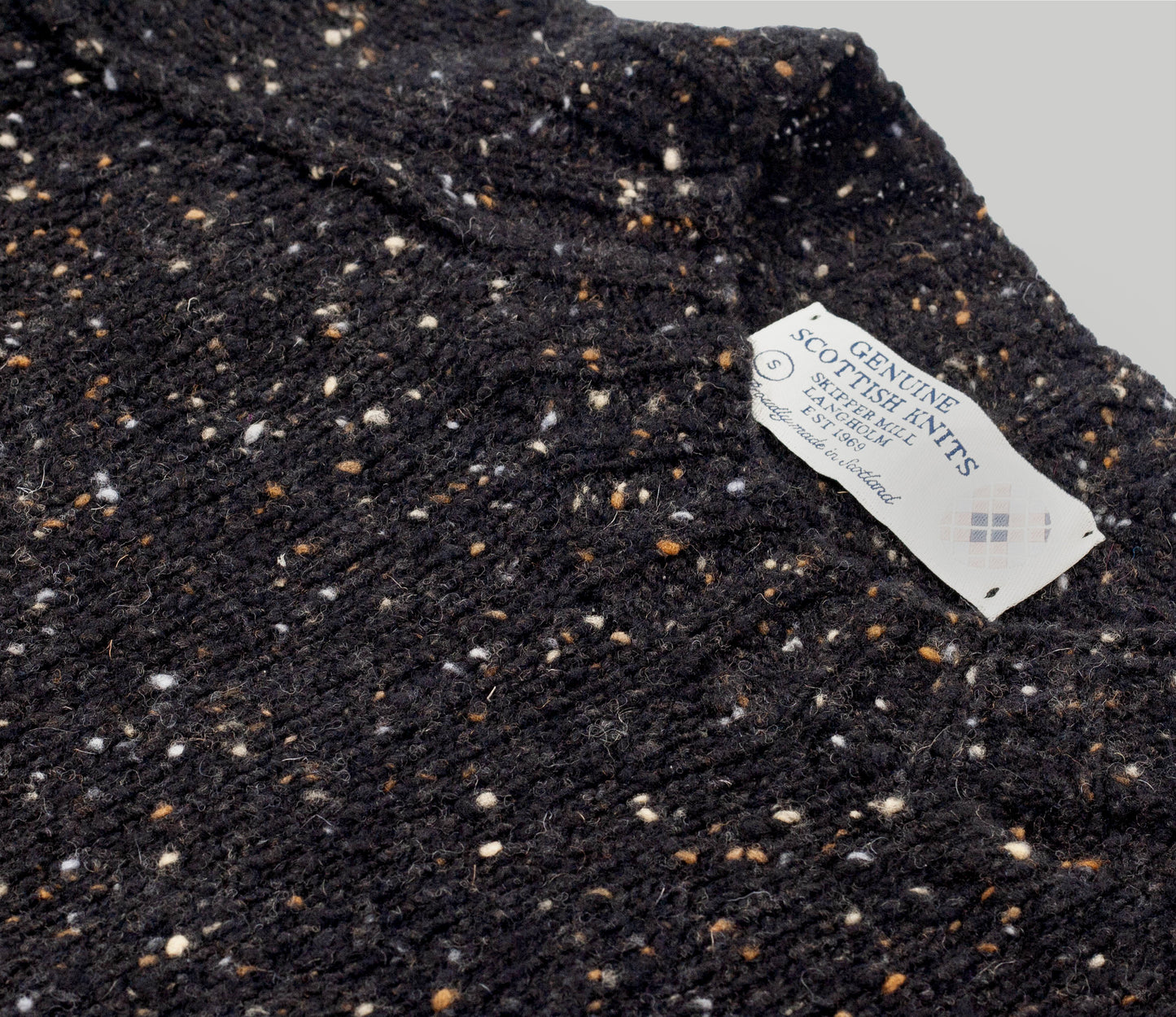 Merino Wool Donegal Crew Neck Jumper in Black Tweed